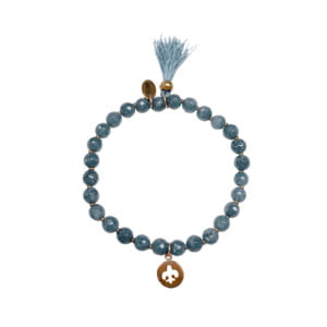 Bracelet MAELYSSE en pierres naturelles bleues avec un pompon et une pampille