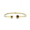 Bracelet jonc Co88 France en acier inoxydable doré et pierre naturelle oeil de tigre