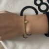 Bracelet Co88 France en acier inoxydable doré et pampille