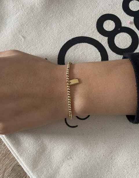 Bracelet Co88 France en acier inoxydable doré et pampille