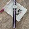 Montre Co88 France en acier inoxydable argenté, tissu de couleur et cadrant blanc