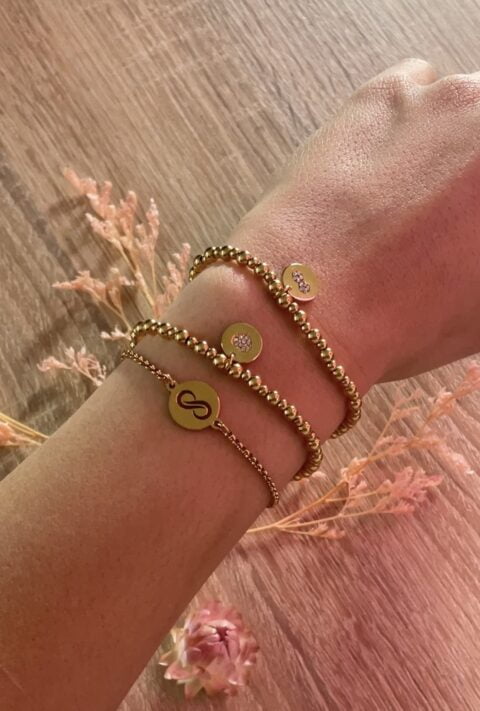 Composition de bracelets Co88 France en acier inoxydable doré, pampilles cœur et infini motif infini