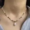 Collier CASSANDRE en acier inoxydable de la marque CO88France en perles colorées et nacrées et pampille perle d'eau douce